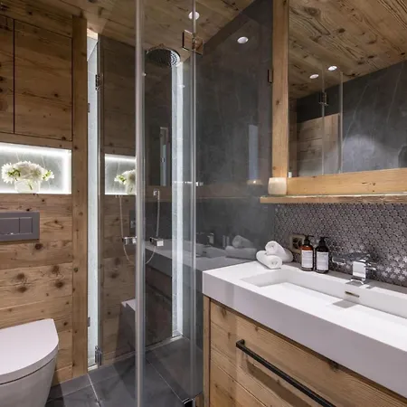 Davos Majesty: Unveil The Charm Of An Alpine Apartment Bedra